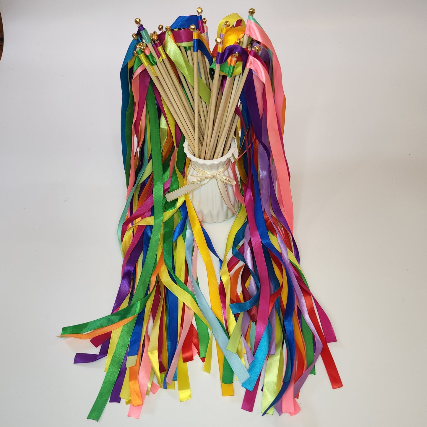 Varitas con cascabel multicolor
